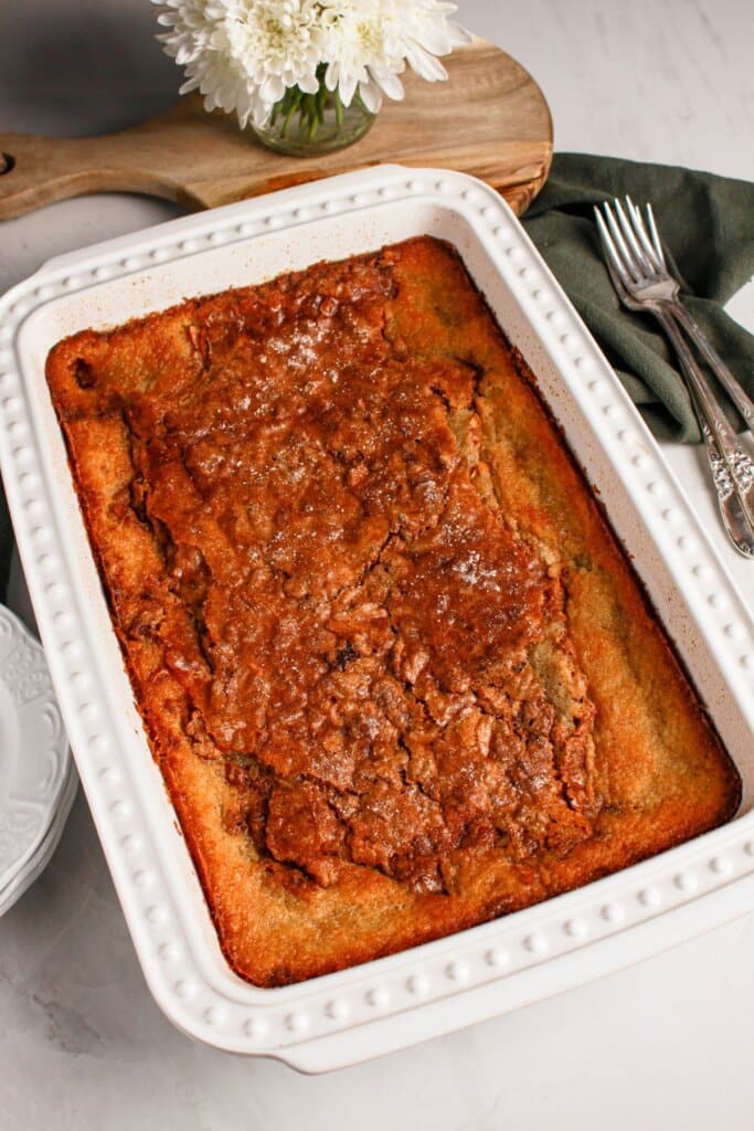 Pecan pie cobbler in a baking dish.