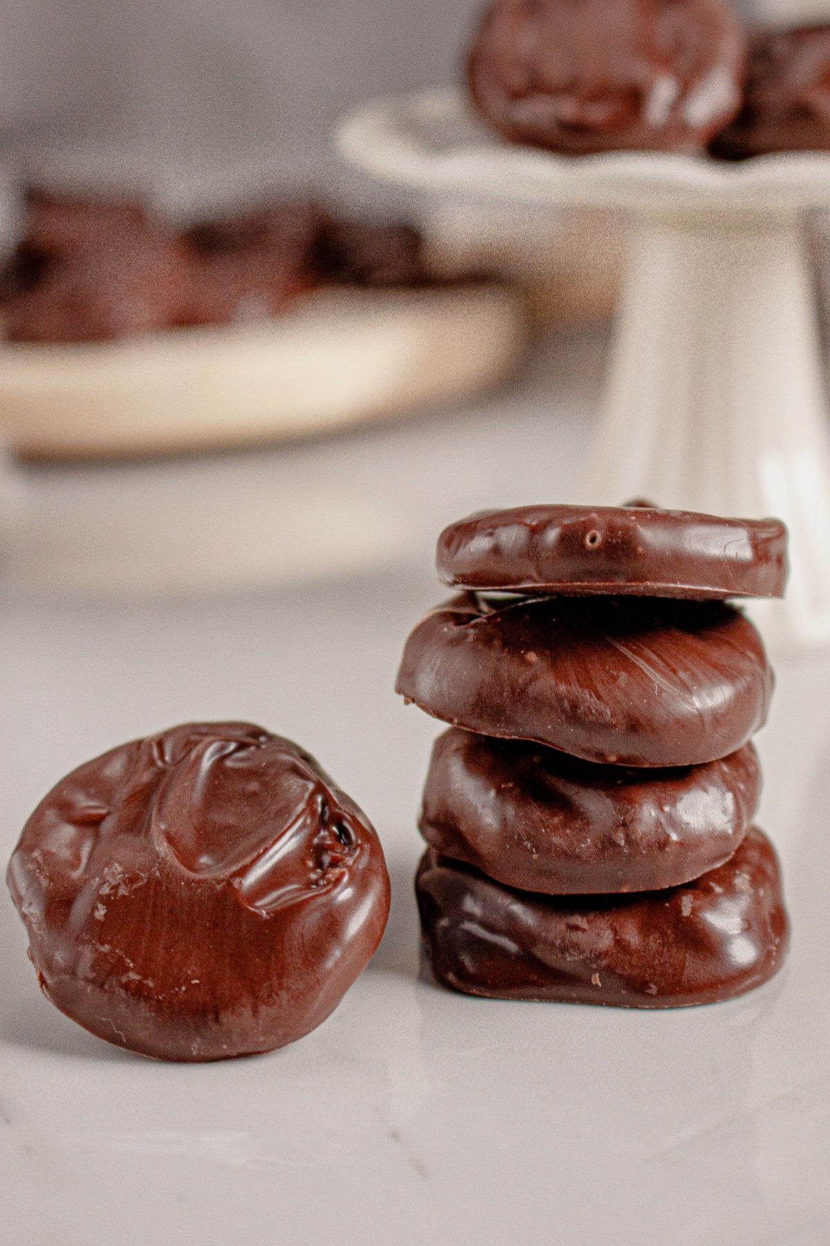 Peppermint patties stacked on a counter.