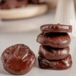 Peppermint Patties stacked on a counter.