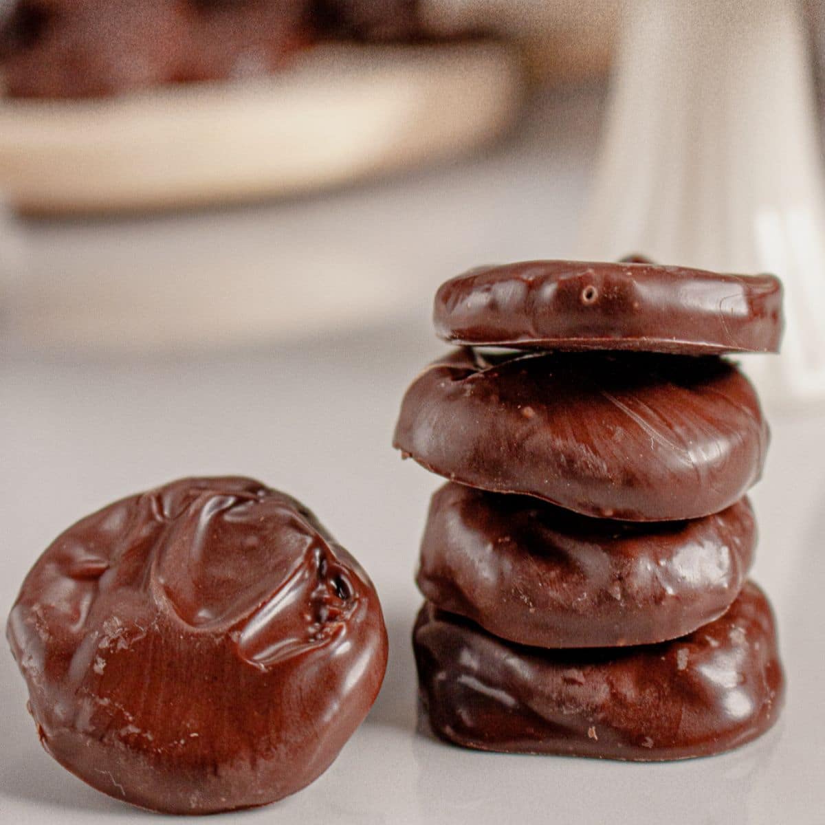 Peppermint Patties stacked on a counter.