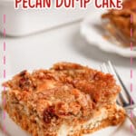 Slice of pumpkin pecan dump cake on a plate.
