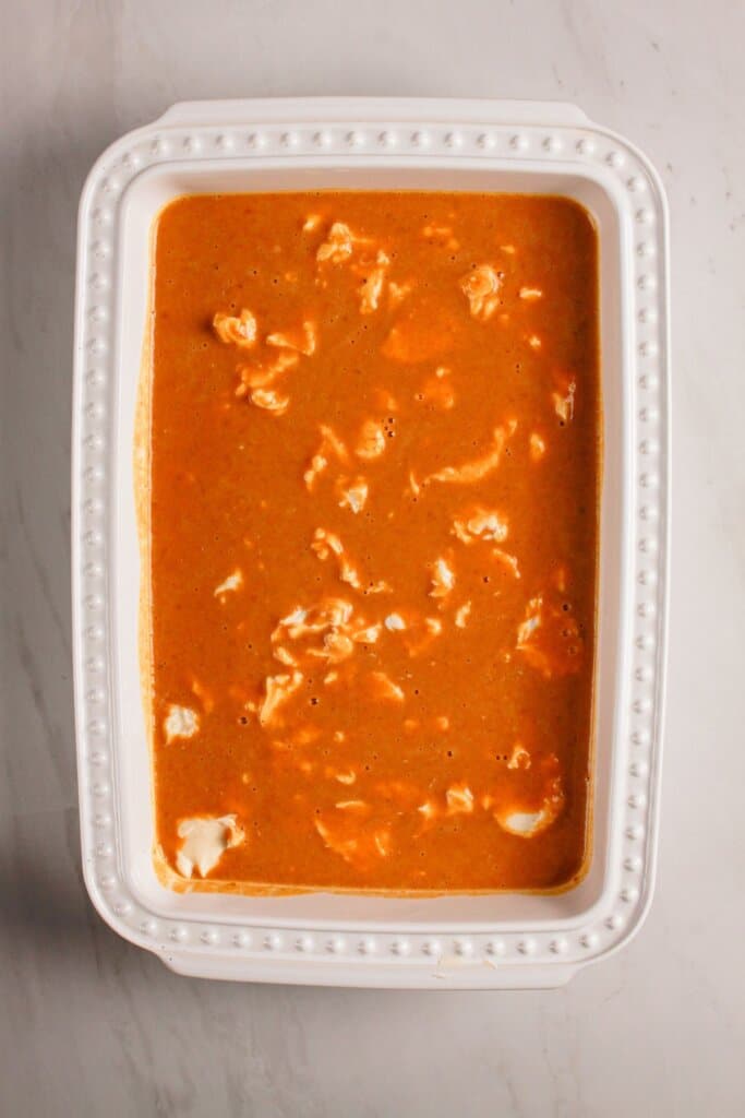 Pumpkin and cream cheese in a baking dish.