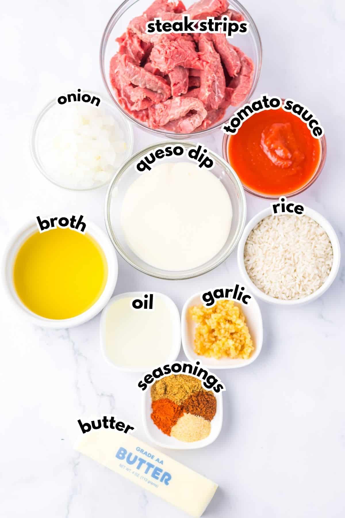 Bowls of ingredients labelled with text on the counter.