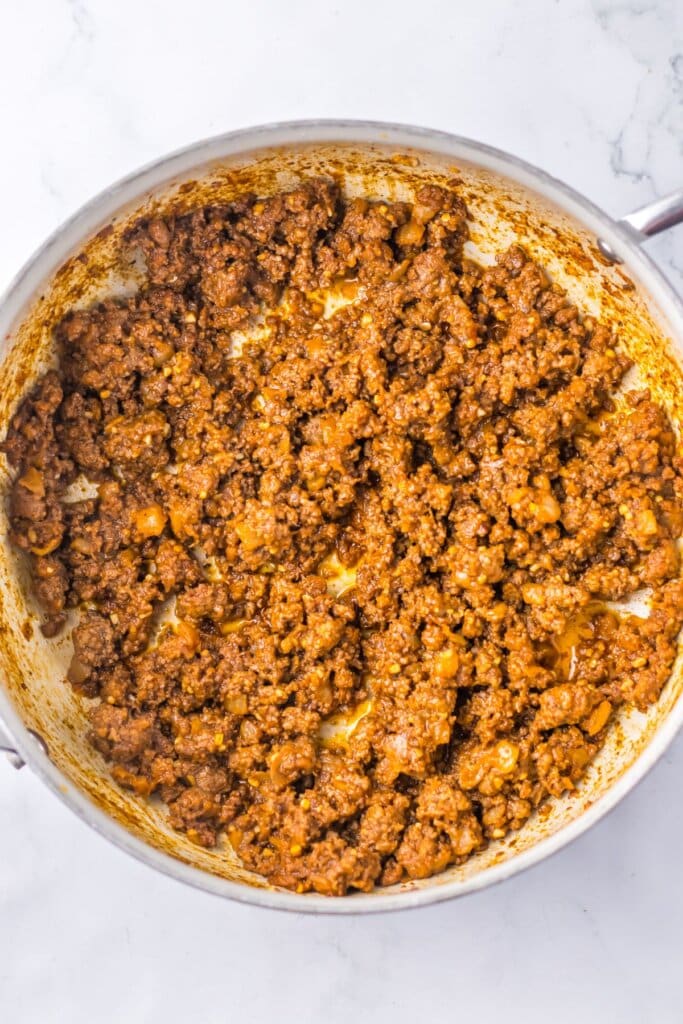Ground beef mixture in a large skillet.