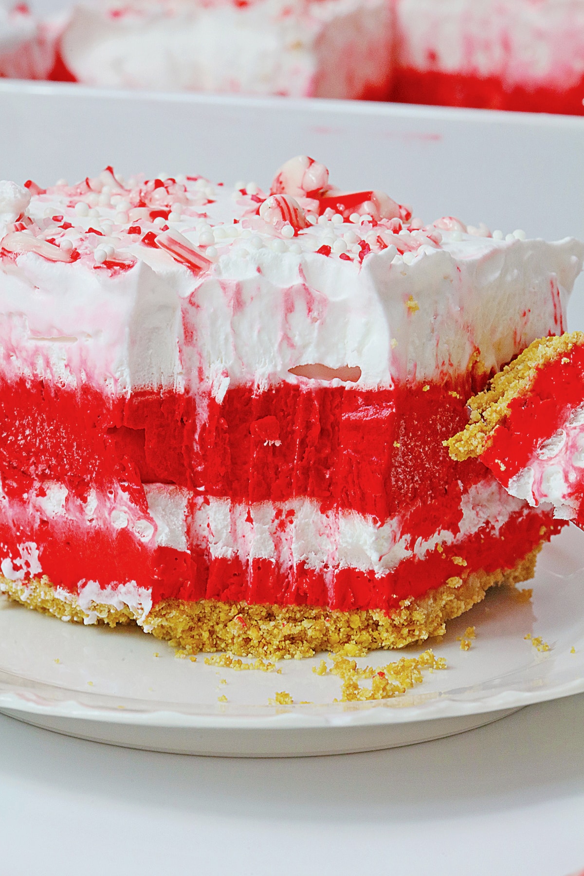 Slice of candy cane lush on a plate.