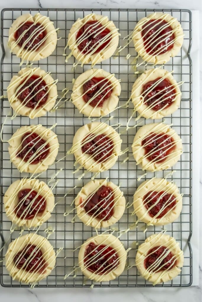 Cherry pie cookies cooling on a wire rack.