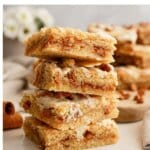 Four cinnamon chip cookie bars stacked on top of each other.