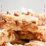 Four cinnamon chip cookie bars stacked on top of each other.