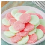 Plate of cream cheese candy melts on a table.