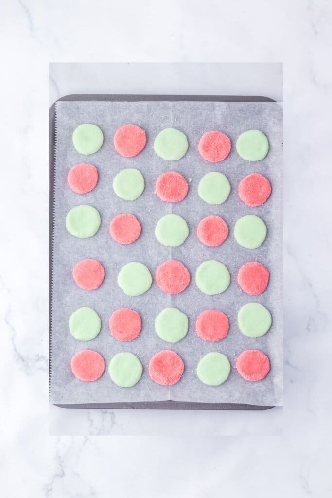 Candy on a parchment lined baking sheets.
