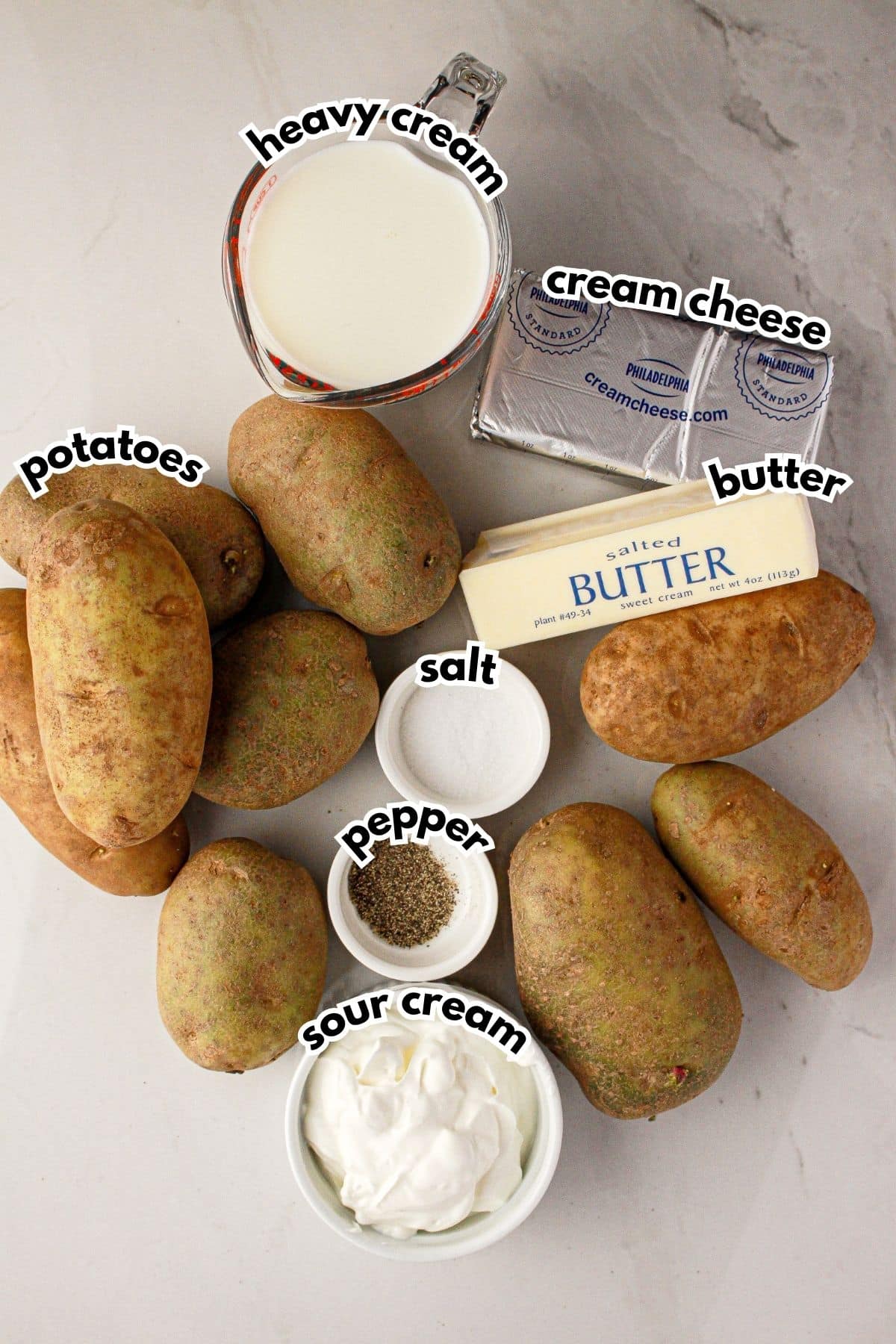 Ingredients labelled with text on a counter.