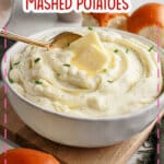 White bowl full of cream cheese mashed potatoes.