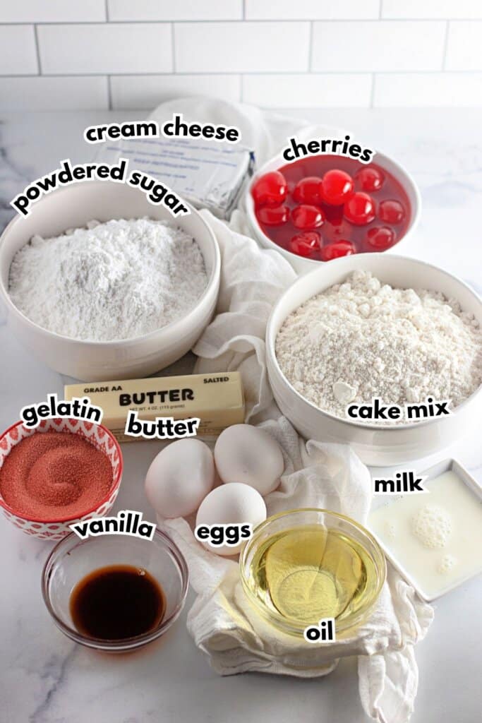 Bowls of ingredients labelled with text on a counter.