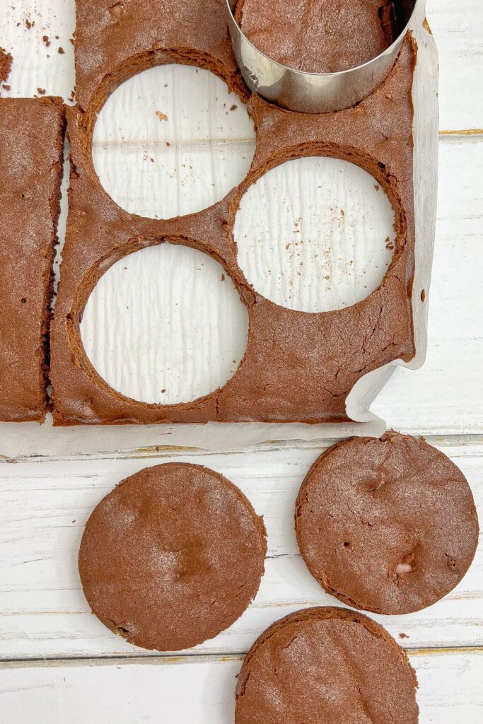 Brownies being cut into circles.