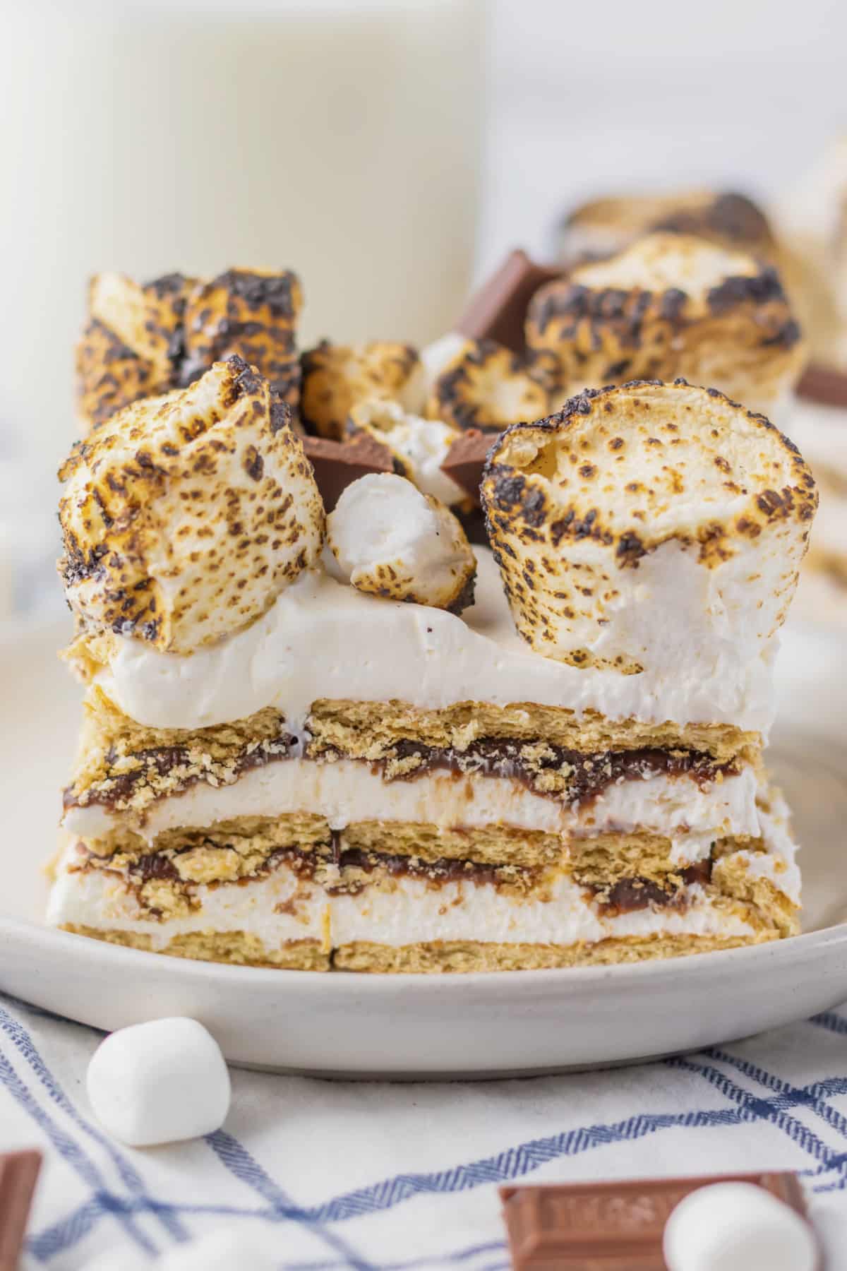 Slice of smores icebox cake on a small plate.