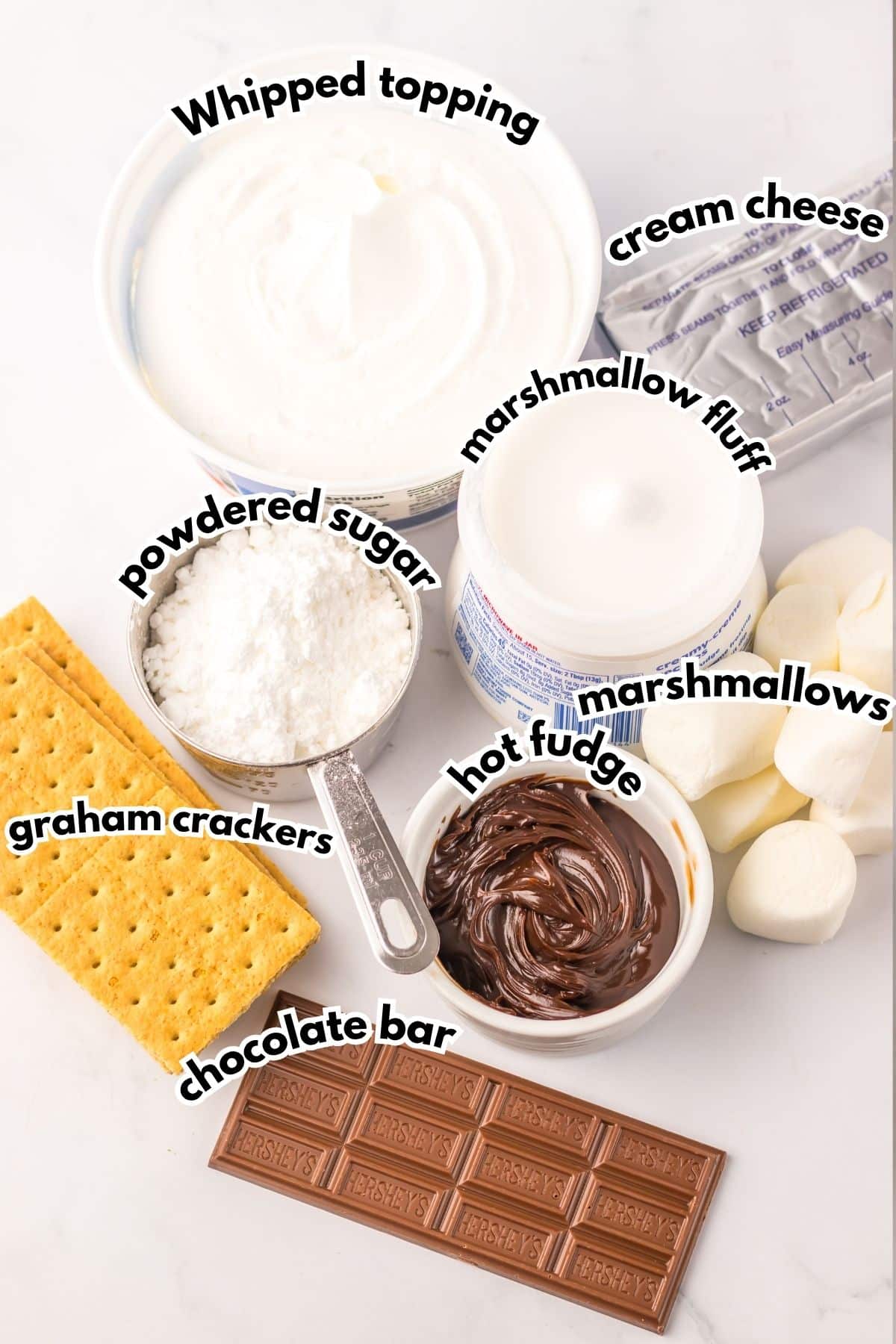 Bowls of ingredients labelled with text on a counter.