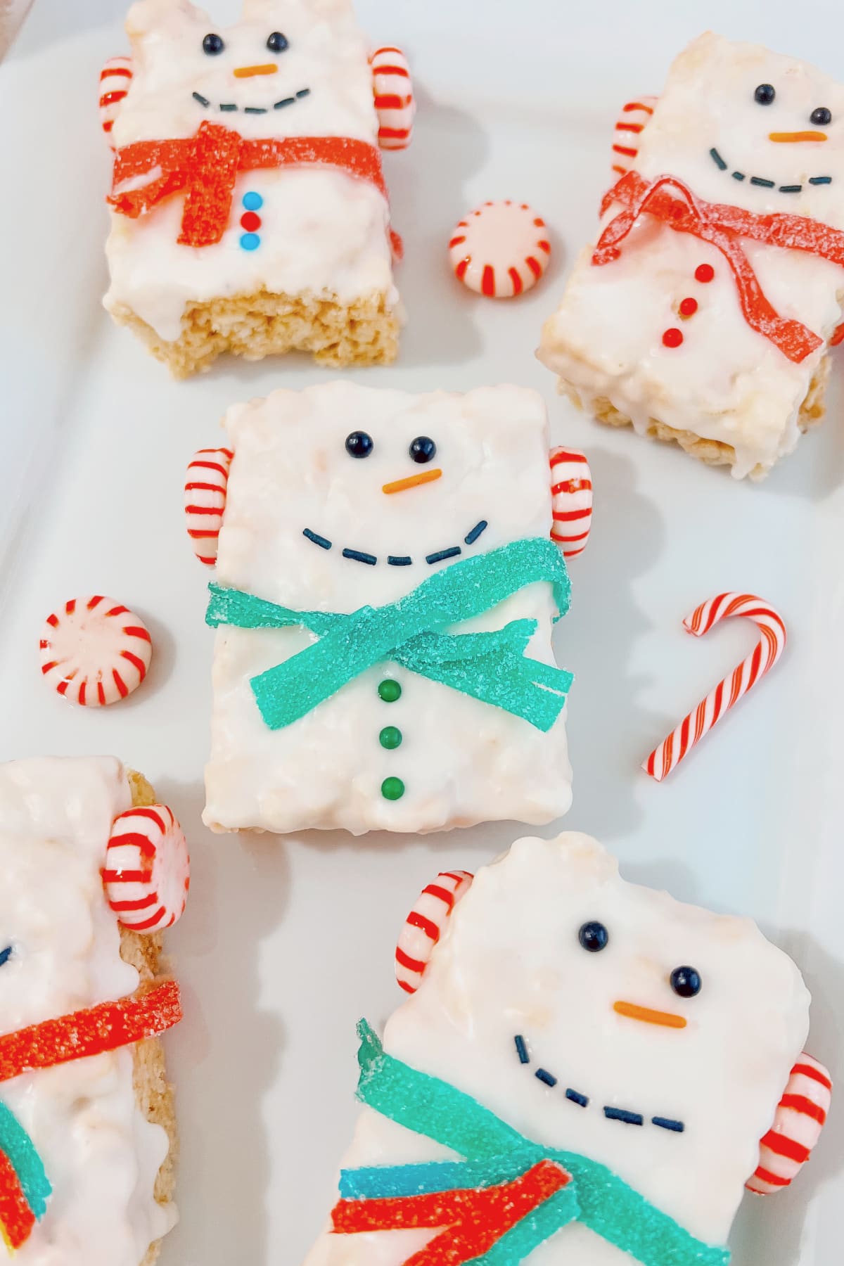Snowman Rice Krispie treat on a plate.