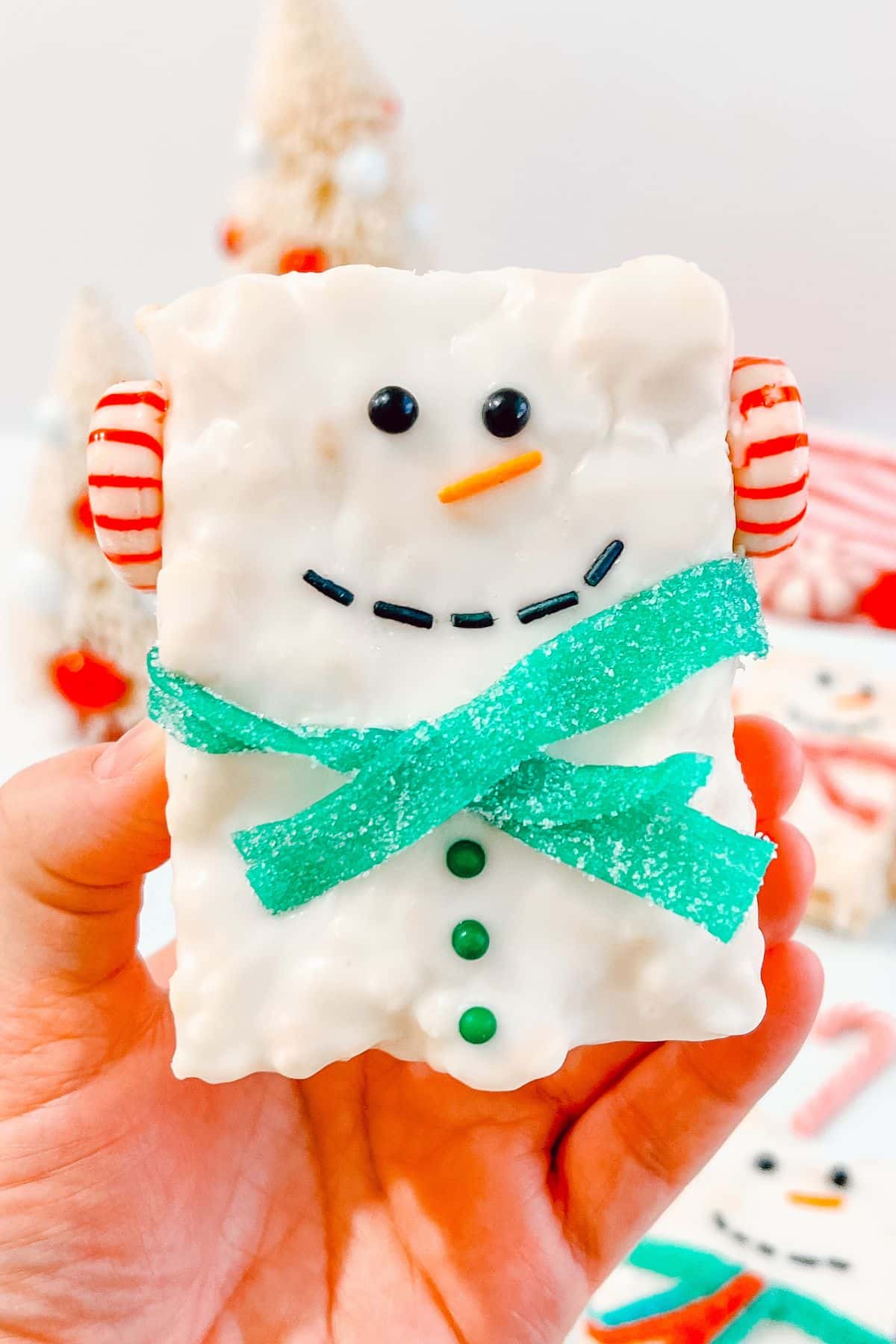 Snowman Rice Krispie treat on a plate.