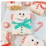 Snowman Rice Krispie treat on a plate.