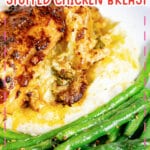 Stuffed chicken breast with spinach and artichoke on mashed potatoes, served with green beans; text overlay reads “Spinach Artichoke Stuffed Chicken Breast.
