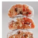 Three cherry cookies stacked on top of each other.