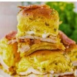 Chicken bacon ranch sliders stacked on a plate.