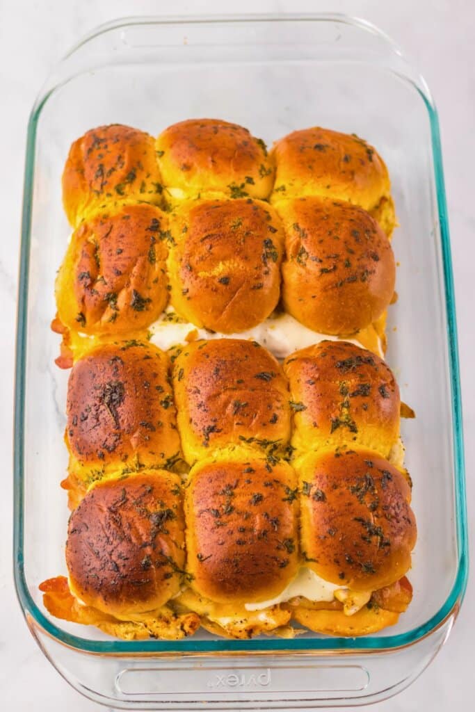Sliders on a glass baking dish.