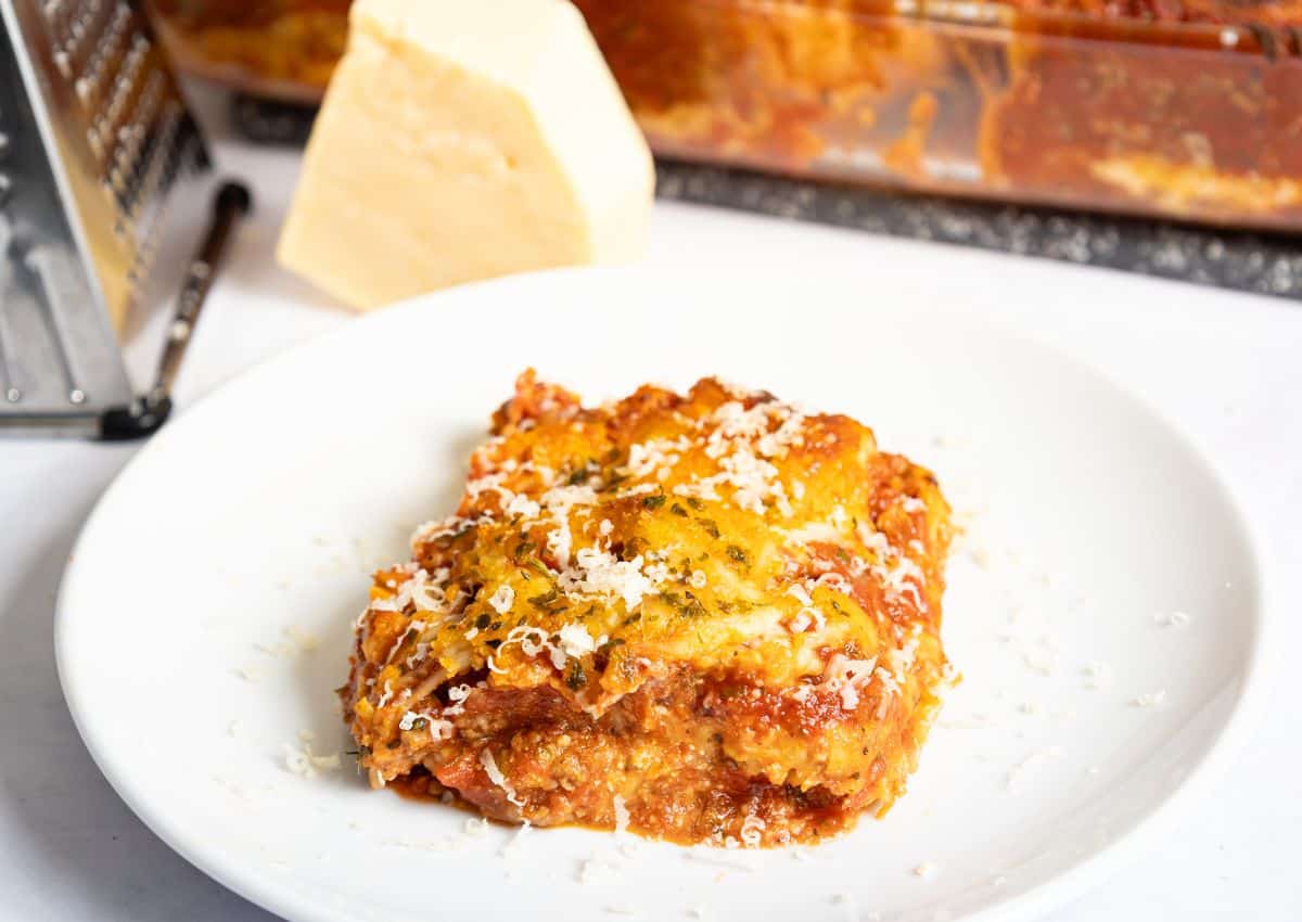 Slice of copycat maggianos lasagna on a plate.