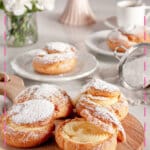 Cream puffs on a wooden lazy susan.