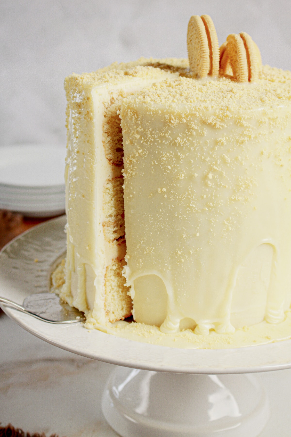 Whole Golden Oreo Cake on a platter.