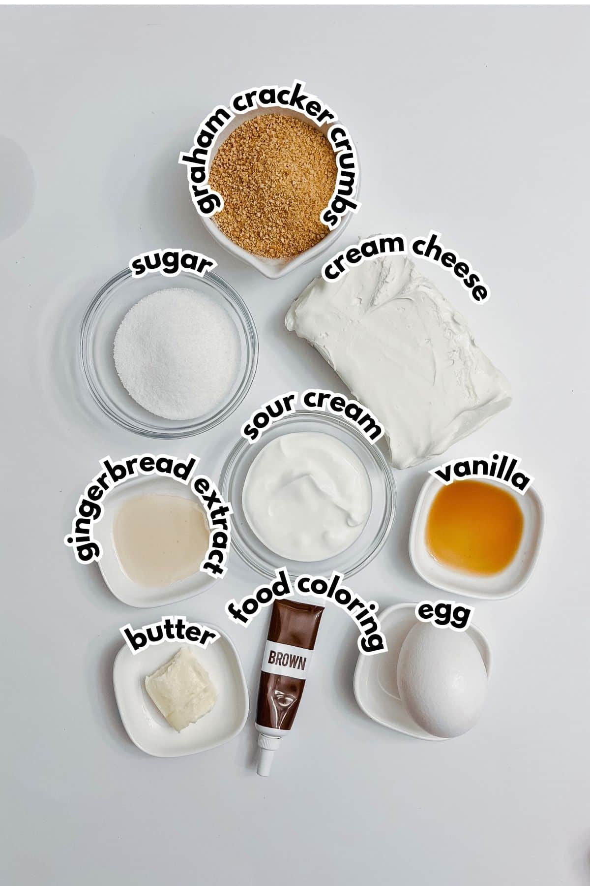 Bowls of ingredients labelled with text on a counter.