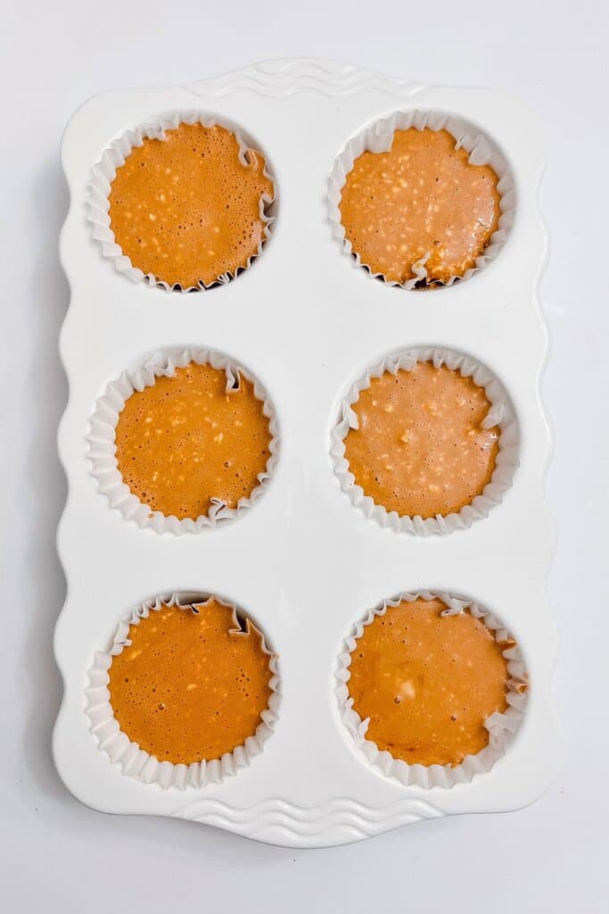 Batter in a muffin pan.