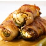 Pickle poppers on a cutting board.