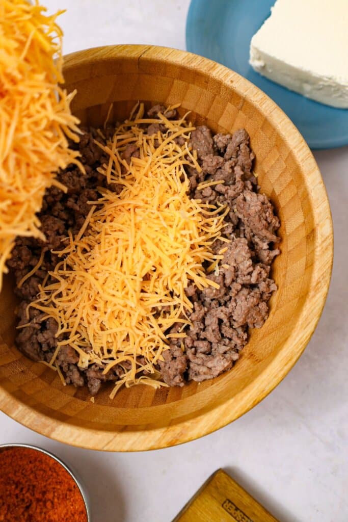 Beef and cheese in a bowl.