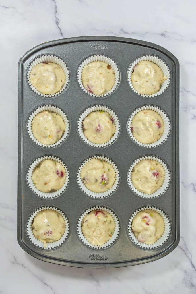 Batter in a muffin pan.