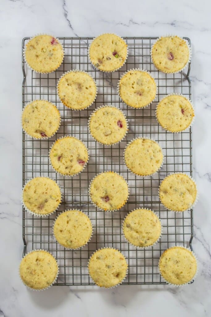 Cupcakes cooling on a rack.