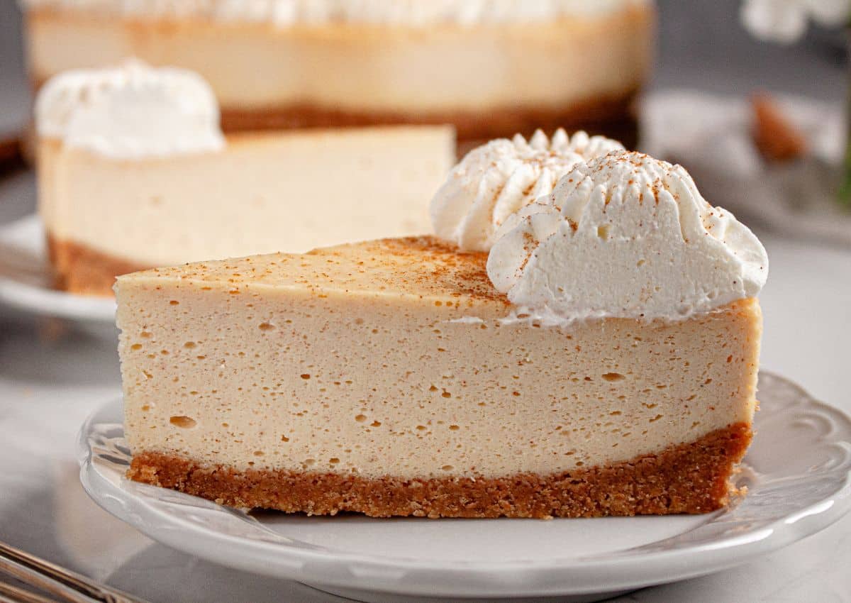 Slice of rumchata cheesecake on a plate.
