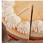 Slice of cheesecake being removed.