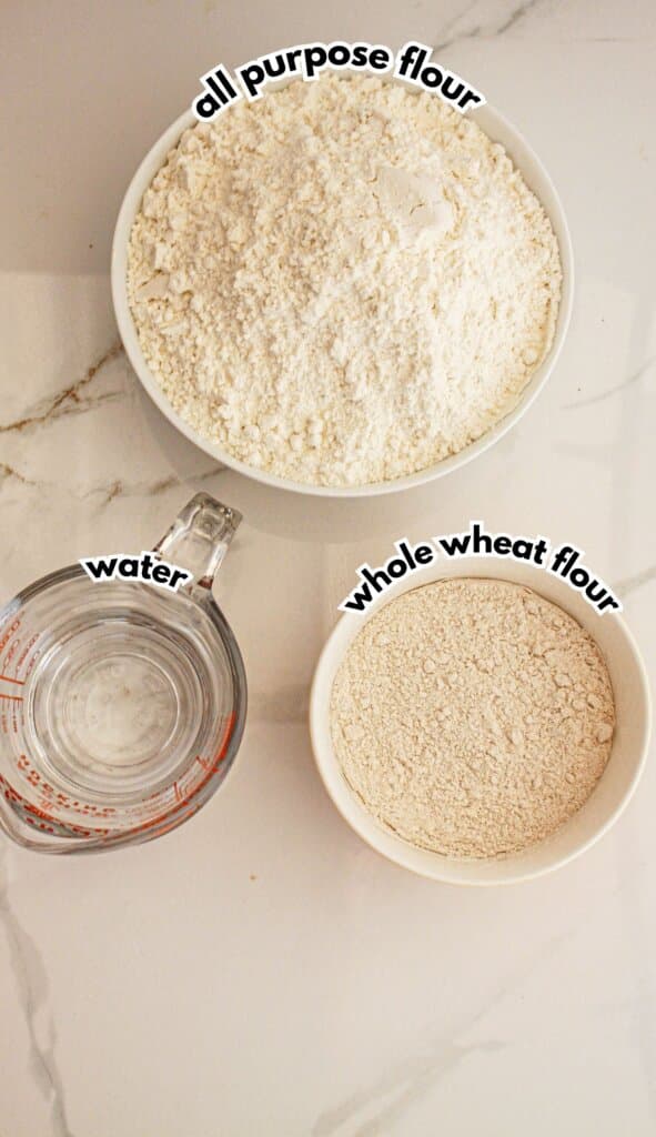 Bowls of flour and water on a counter.