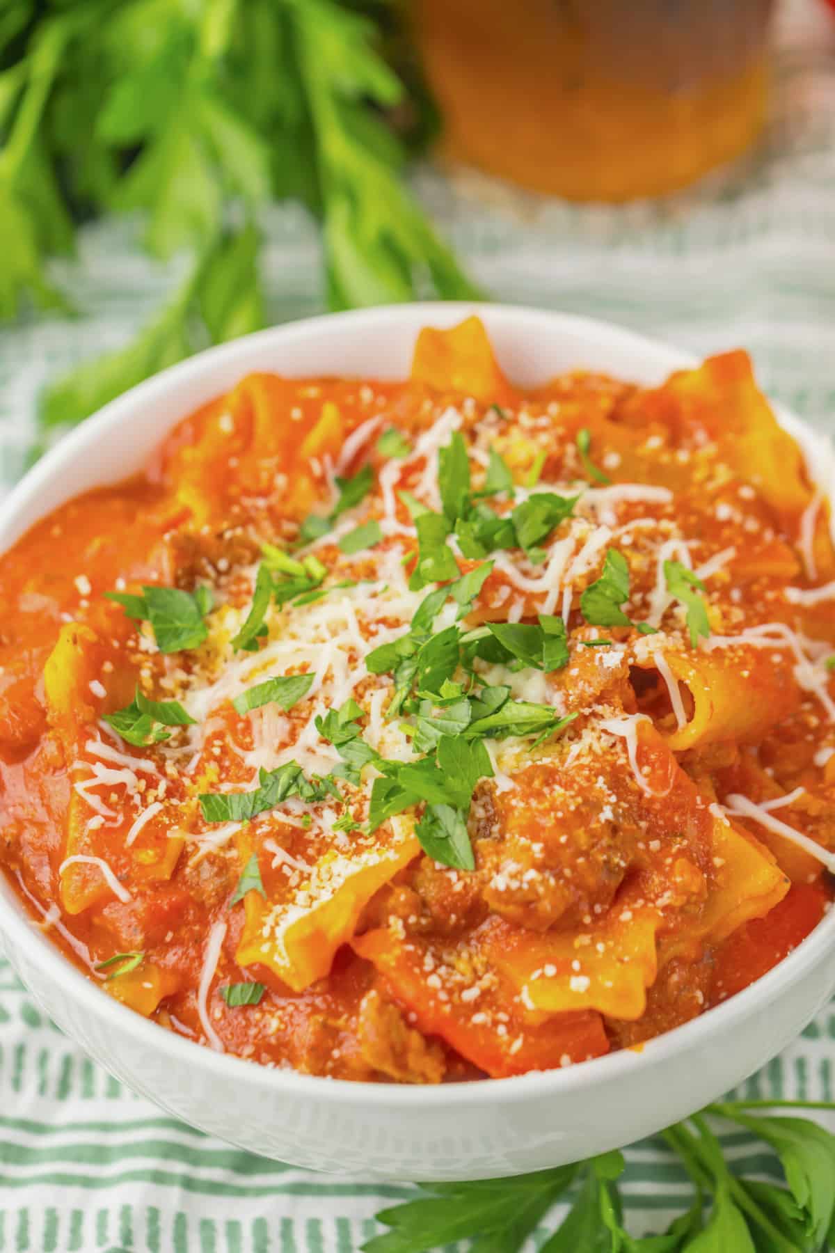 White bowl filled with lasagna soup.
