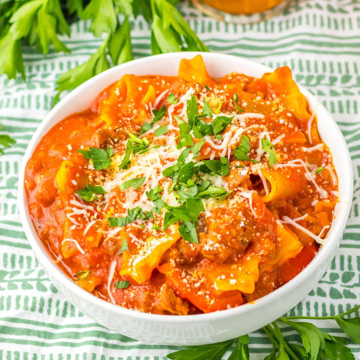 White bowl filled with lasagna soup.