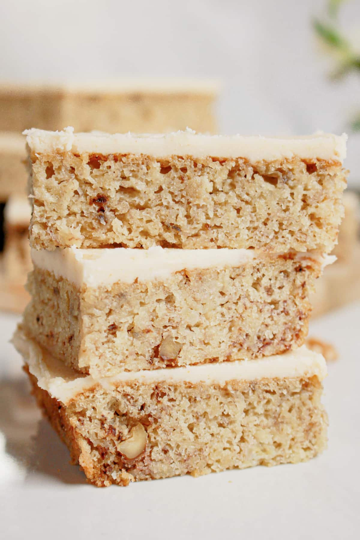 Three banana bread brownies stacked on top of each other.