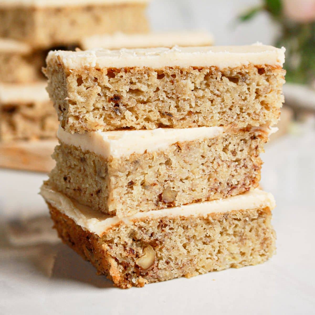 Three banana bread brownies stacked on top of each other.