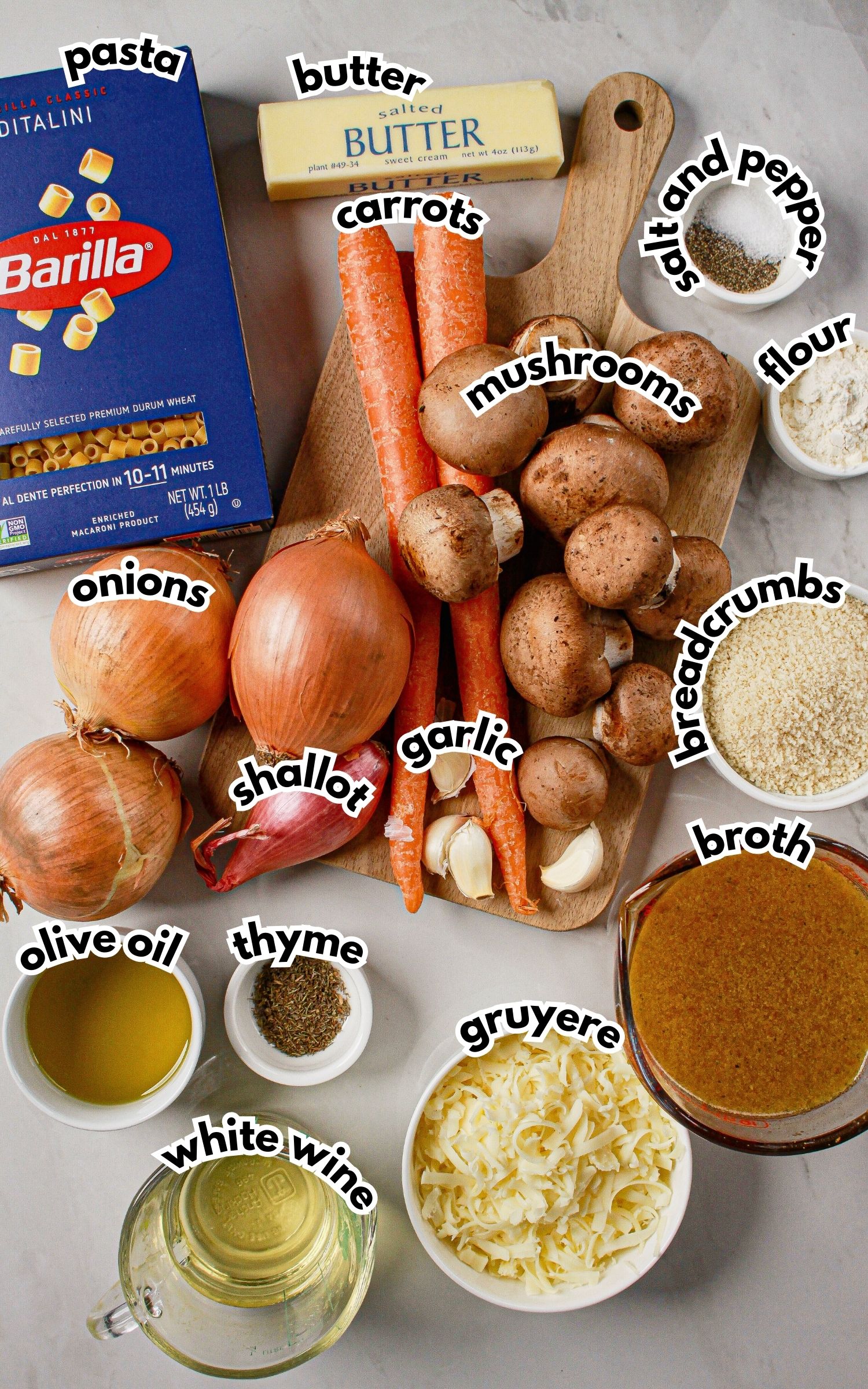 Ingredients laid out on a counter labelled with text.