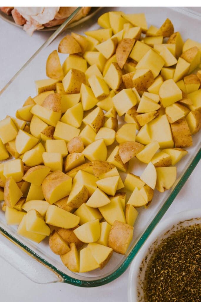 Potatoes in a glass baking dish.