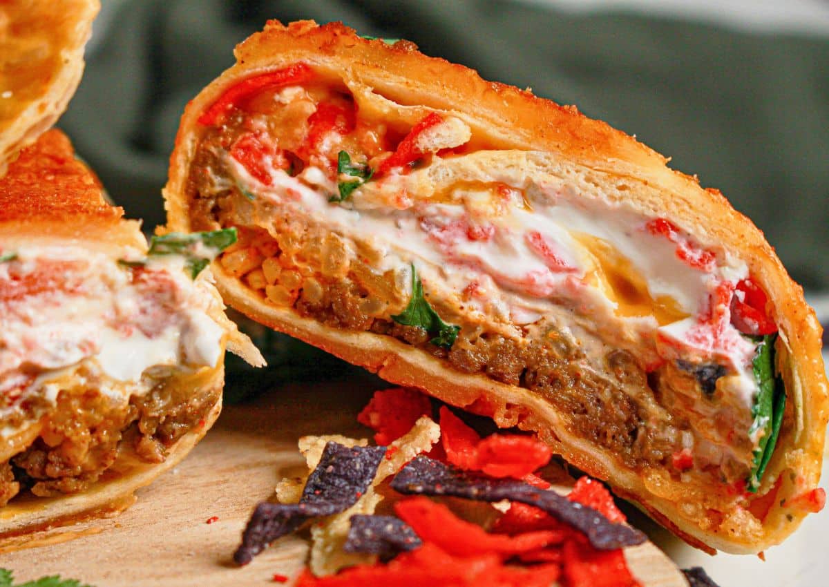 Grilled cheese burrito cut in half.