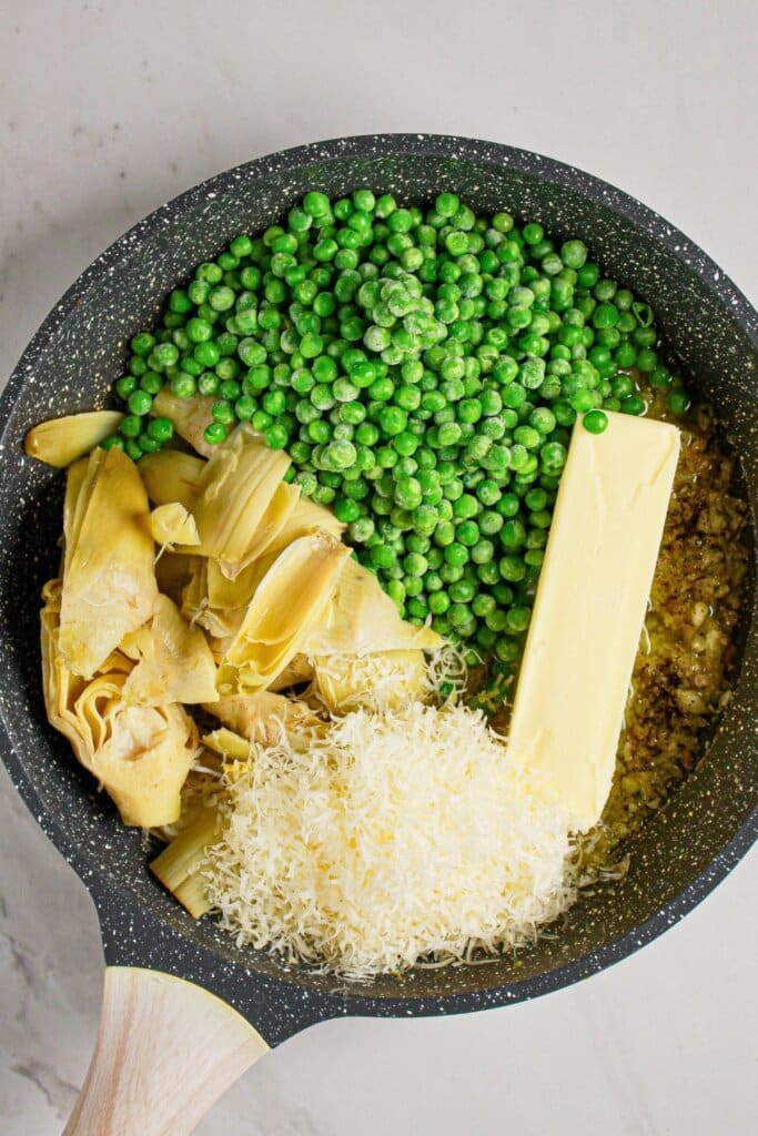 Ingredients in a large skillet ready to cook.