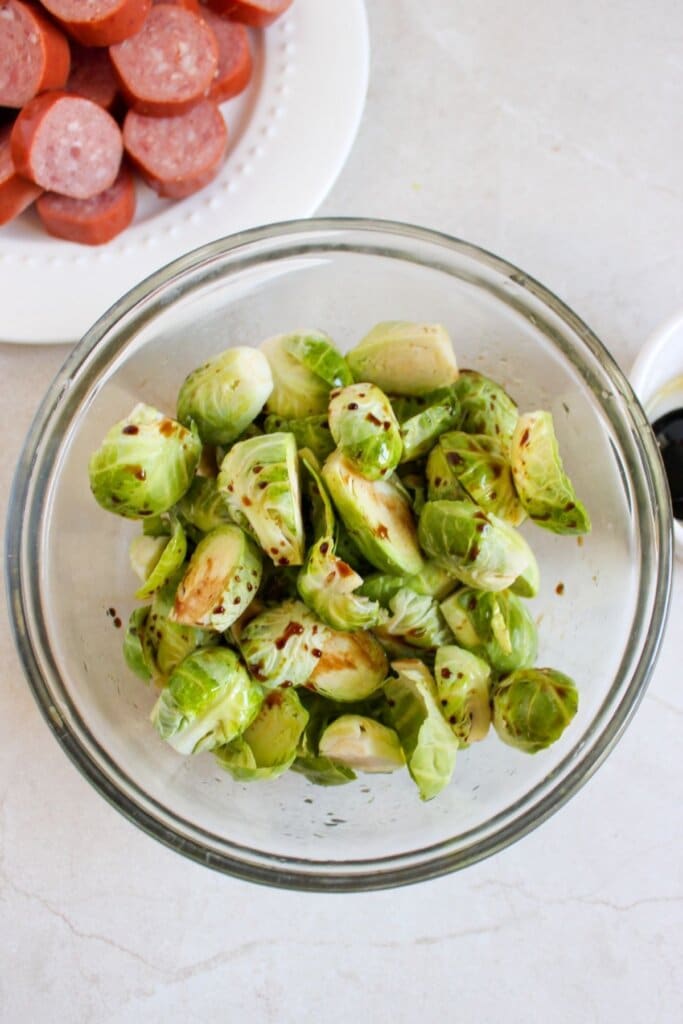 Brussels sprouts in a glass bowl.