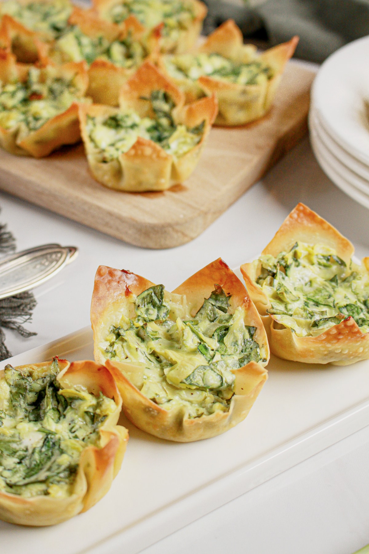Spinach Artichoke Wonton Cups on a platter.