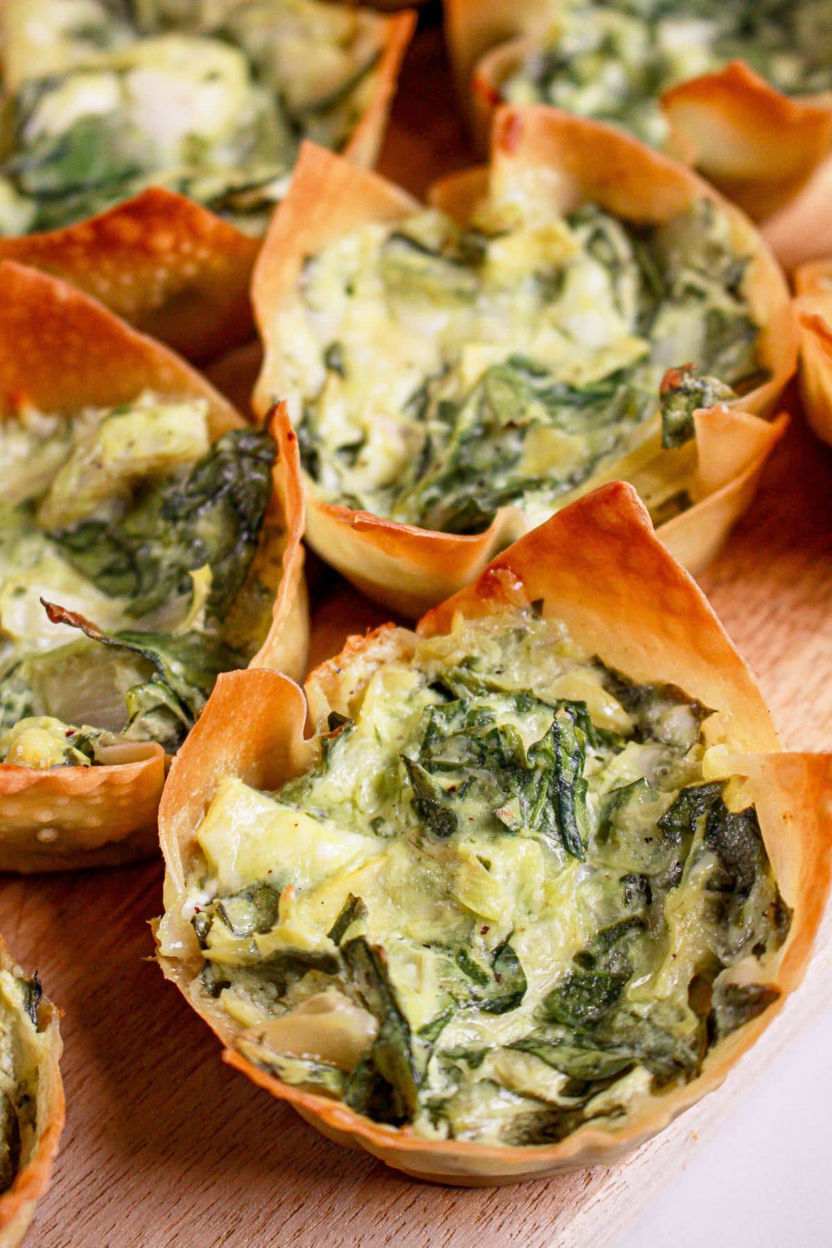 Spinach Artichoke Wonton Cups on a platter.